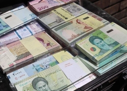 واحد پول ملی ریال باقی می‌ماند 
