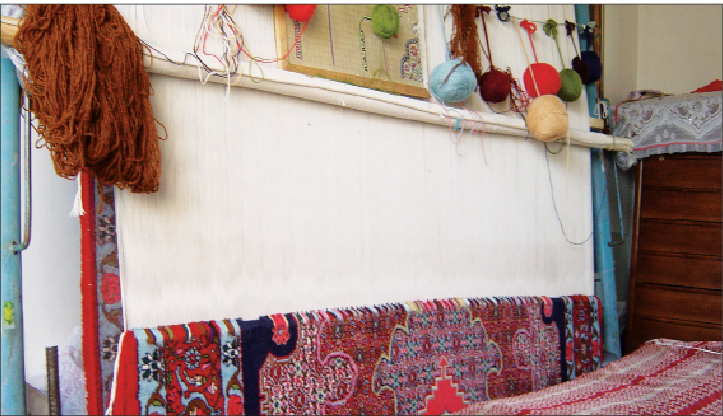 چوب بیمه بر پیکر قالی‌بافی